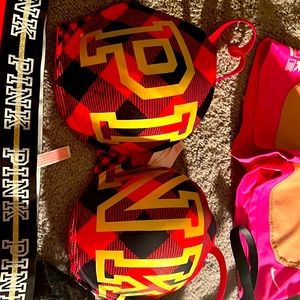 Both new 36D  red with gold letters  and white with black letters